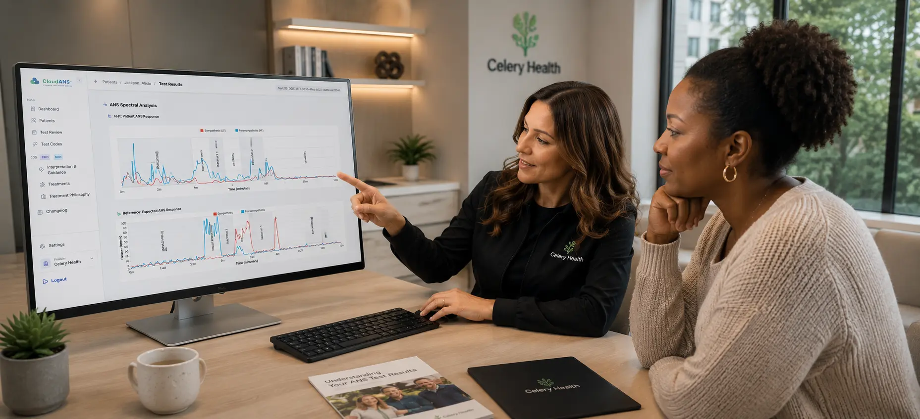 Clinician and patient reviewing autonomic results together in a warm clinical setting